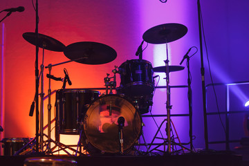Silhouette of Drums with Colored Lights 