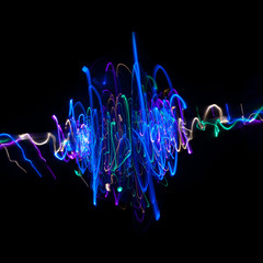 Light drawings on black background. Lines on a spiral