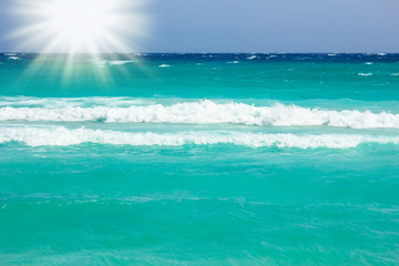 beautiful beach with waves in the nature of the background