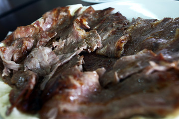 Turkish Doner Kebab with pita in dinner plate