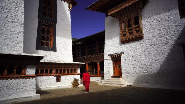 Temple and religious prayer flags in valley, Bhutan