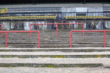 old stadium for a large number of spectators. Abandoned grandstands and buildings