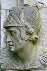 Obraz premium Stone head carving of soldier, guarding entrance of Kilkenny Castle Ireland
