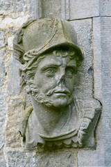 Fototapeta na wymiar Stone head carving of guardian soldier, Kilkenny Castle Ireland