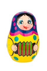 traditional souvenir yellow matryoshka russian doll, with white background, isolated and close up