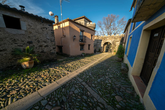 Sunset View At A Medieval Age Town In Extremadura, Spain. A Diminishing Perspective View Of The Street And Houses Of The Historical Granadilla Town
