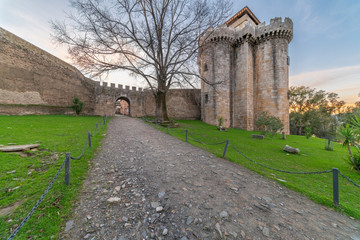 Fototapeta na wymiar A medieval age scenery at the amazing and abandoned Granadilla town. The impressive medieval castle with it tower in between the surrounding defense wall is an awe representation of the human history 