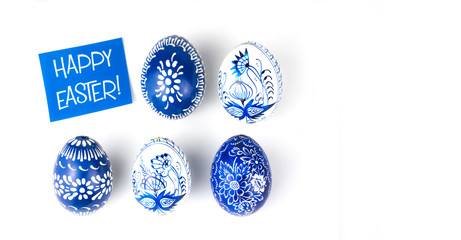 easter eggs with blue and white floral ornaments