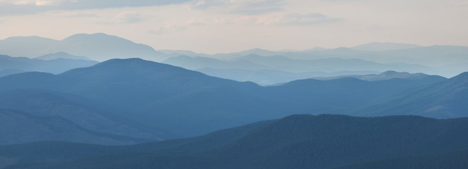 Evening haze in the mountains, sunset light