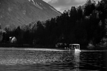 boat crossing the lake bled in slovenia
