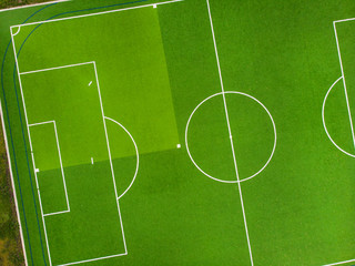 Obraz premium Green field for football and baseball. Top view. For design.