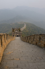 Sunset view East from tower 14 on the Mutianyu Great Wall of China north of Beijing