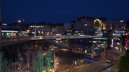 night illuminated lausanne city central traffic street square rooftop panorama 4k switzerland