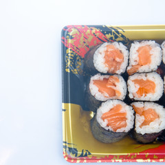 Sushi Roll with salmon on the white background .Food abstract background