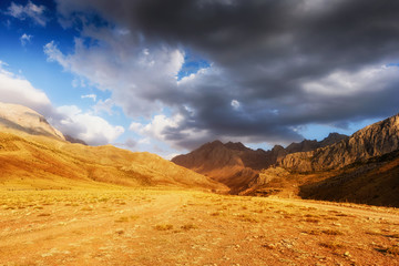 Naklejka premium Panoramic view of the mountains at sunset in the Turkish national Park aladag in summer