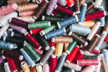 Color sewing threads close-up shot. Selective focus. Shallow depth of field.