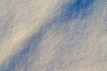 Texture of the white snow. Winter background