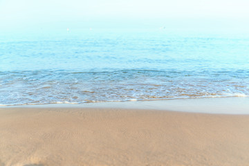 Tropical sea beach with sand and wave of the sea