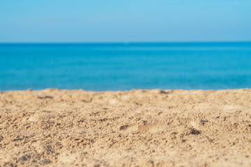 Tropical sea beach with sand, ocean and blue sky