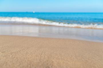 Fototapeta na wymiar Tropical sea beach with sand and wave of the sea
