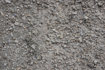 Concrete wall texture with small pebbles