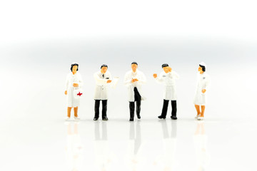 Fototapeta na wymiar Miniature people : Doctor and Nurse emergency medical team with pills and Ambulance ,Health care, medical service, and insurance concept.