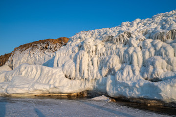 The rimed coast of the island Olkhon in Lake Baikal.