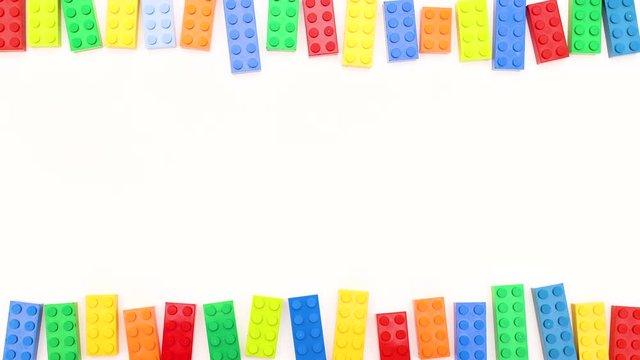 Colorful bricks moving on bottom and top f white background - Stop motion