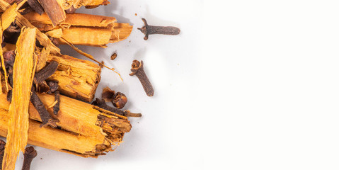 Ceylon cinnamon and cloves - Isolated on white - Sri Lankan spices 