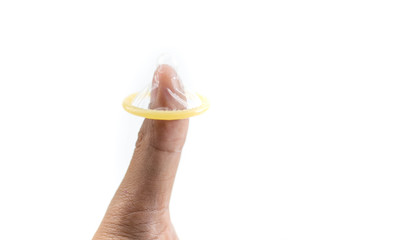 Condom in men finger on white background, Safe sex or Valentine's day concept.