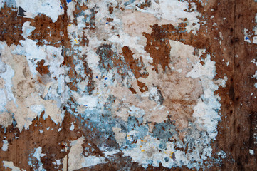 Distress wooden board texture and torn paper on it. Grunge background for wallpaper and web design