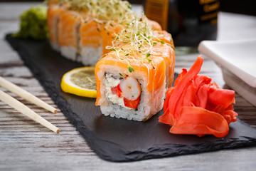 Tasty sushi set. Japanese traditional dishes. Rice rolls. Close up.