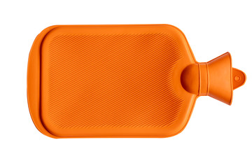 close up of rubber hot water container equipment for domestic treatment of illness in orange color, isolated on white with clipping path.