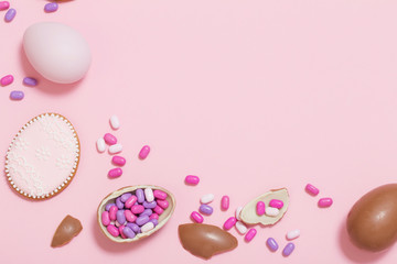 Easter pink background with eggs and flowers