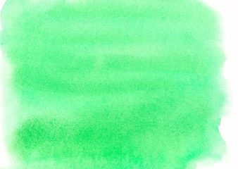 bright green watercolor background painted with a brush on white paper reminiscent of grass on a summer day, which is perfect for designers in various projects