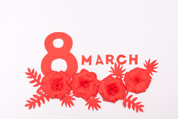 March 8 Women's Day card with red paper flowers on white background