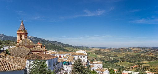 Fototapeta na wymiar Panorama of the church and surrounding landscape of Zahara de la Sierra, Spain