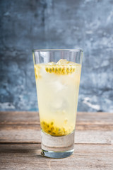 Passion fruit cocktail in highball glass. Selective focus. Shallow depth of field.