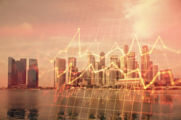 Forex chart on cityscape with tall buildings background multi exposure. Financial research concept.