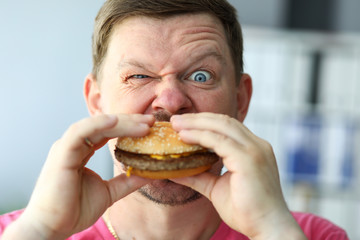 Championship on eating burgers, high-speed eating. Hunger, daily human diet. An experiment with quality products, amazing taste and unusual combinations. High calorie meal. Whole grain burger.