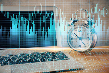 Multi exposure of chart and financial info and work space with computer background. Concept of...