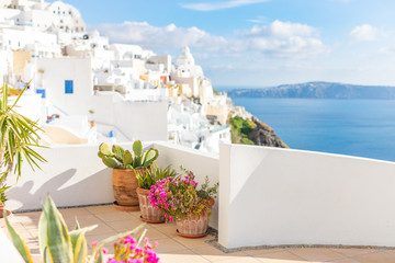 Beautiful panoramic view on the mediterranean sea, caldera and volcano. Traditional white architecture of Santorini island, Thira, Greece. Cruise ship in blue sea.