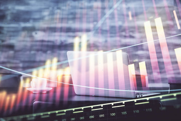 Forex Chart hologram on table with computer background. Multi exposure. Concept of financial...