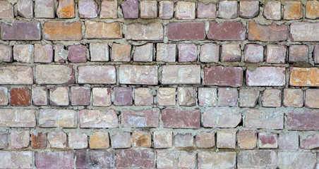 Old brickwork or wall of old brick background. Texture and pattern of a brick stone wall