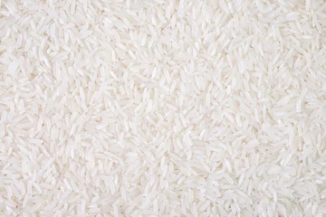 Fototapeten Top view of white rice seed texture background. Organic, natural long rice grain, food for healthy. Agriculture of culture asian. Flay lay © otello-stpdc