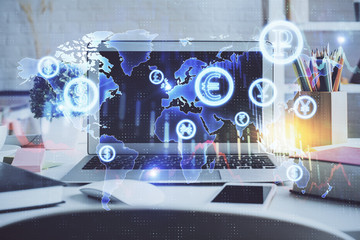 Financial chart drawing and table with computer on background. Double exposure. Concept of international markets.