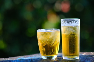 glass of beer on a wooden background
