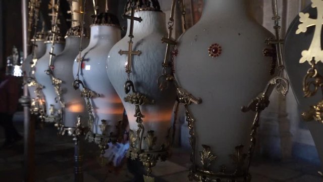 Decorated lanterns above the Stone of Unction