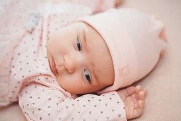 portrait of a little girl: baby's face close-up. concept of childhood, healthcare, IVF