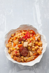 chick pea with cabbage, carrot and smoked sausages in beautiful bowl